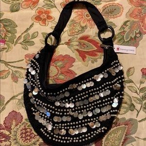 Charming Charlie black  pearl/mother or pearl bag